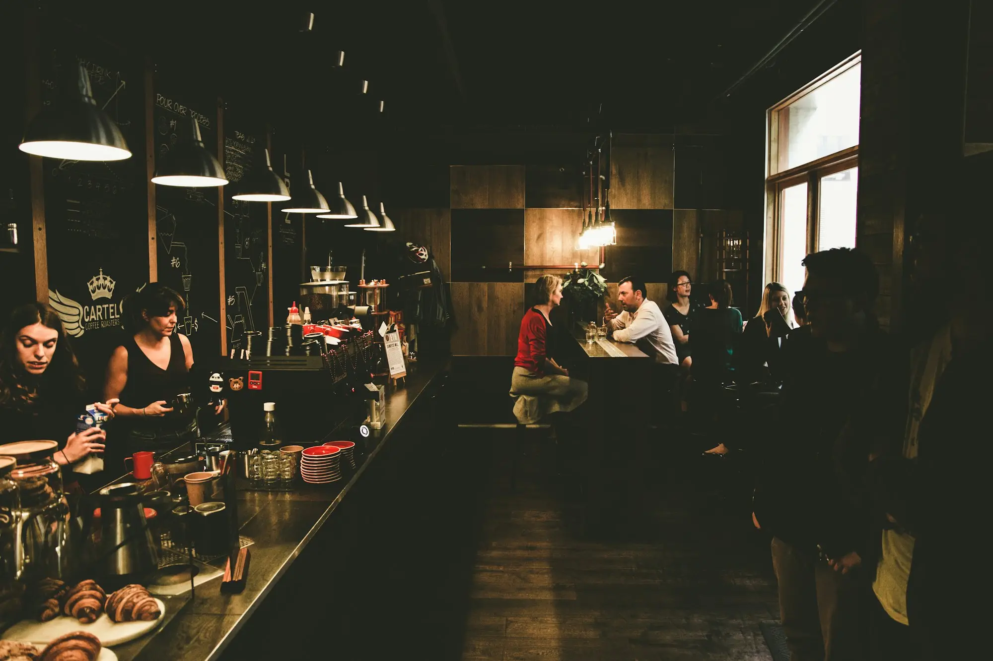 Busy specialty coffee café in Melbourne with customers at the counter